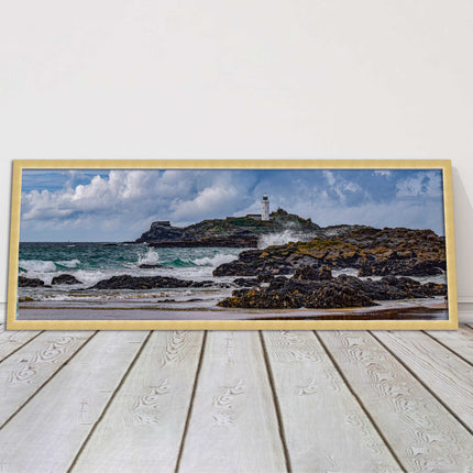 Godrevy Lighthouse with breaking waves at the shore. Cornwall. Framed picture