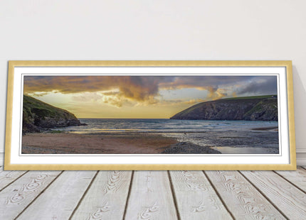 Mawgan Porth at sunset. Panoramic framed picture print. A choice of frames.