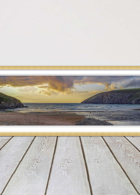 Mawgan Porth at sunset. Panoramic framed picture print. A choice of frames.