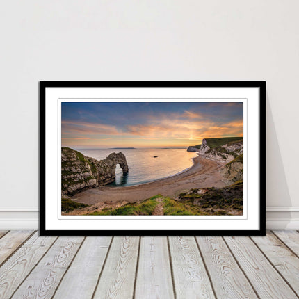 Durdle door at sunset, Dorset. Framed picture with a choice of frame colours.