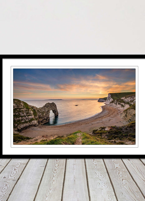 Durdle door at sunset, Dorset. Framed picture with a choice of frame colours.