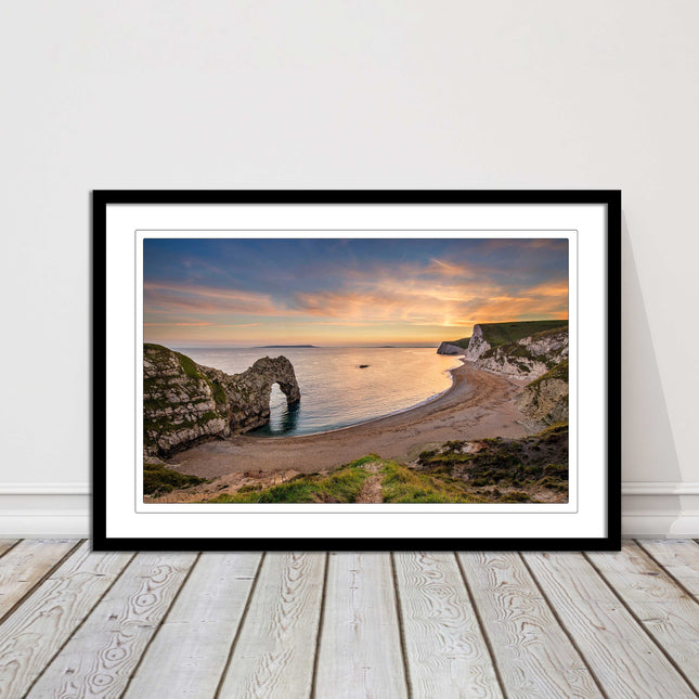 Durdle door at sunset, Dorset. Framed picture with a choice of frame colours.