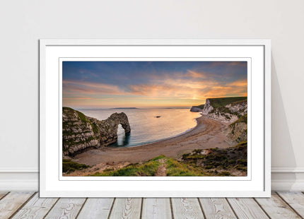 Durdle door at sunset, Dorset. Framed picture with a choice of frame colours.