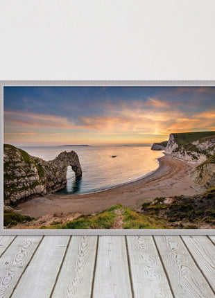 Durdle door at sunset, Dorset. Framed picture with a choice of frame colours.