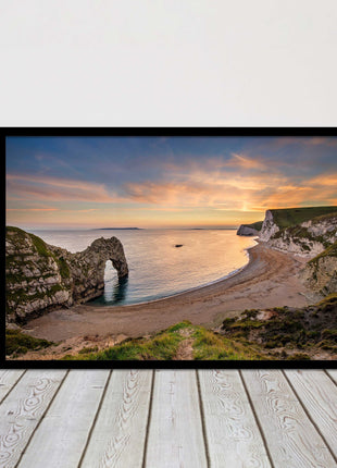 Durdle door at sunset, Dorset. Framed picture with a choice of frame colours.