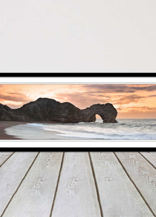 Durdle door on Jurassic coast dorset at sunset. Panoramic framed picture print