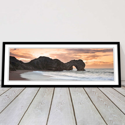 Durdle door on Jurassic coast dorset at sunset. Panoramic framed picture print