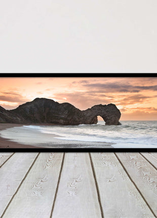 Durdle door on Jurassic coast dorset at sunset. Panoramic framed picture print