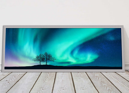 Aurora Borealis, with silhouette of trees. Panoramic framed picture print choice
