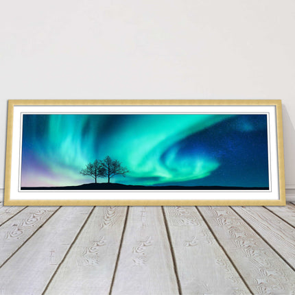 Aurora Borealis, with silhouette of trees. Panoramic framed picture print choice
