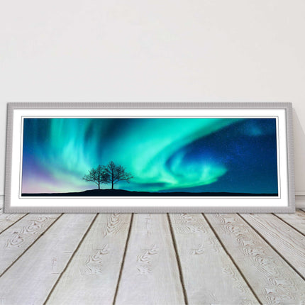 Aurora Borealis, with silhouette of trees. Panoramic framed picture print choice