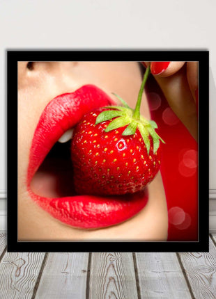 Strawberry red lips eating framed picture print with choice frame colours