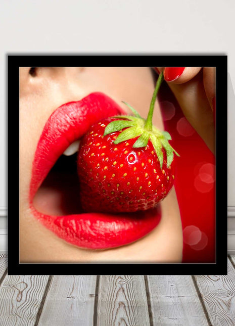 Strawberry red lips eating framed picture print with choice frame colours
