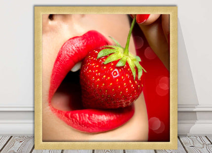 Strawberry red lips eating framed picture print with choice frame colours