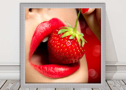 Strawberry red lips eating framed picture print with choice frame colours