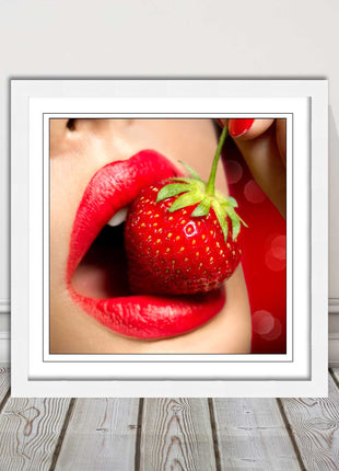 Strawberry red lips eating framed picture print with choice frame colours