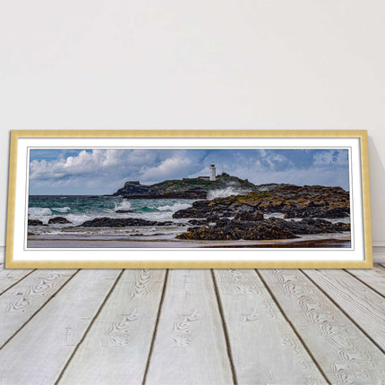 Godrevy Lighthouse with breaking waves at the shore. Cornwall. Framed picture