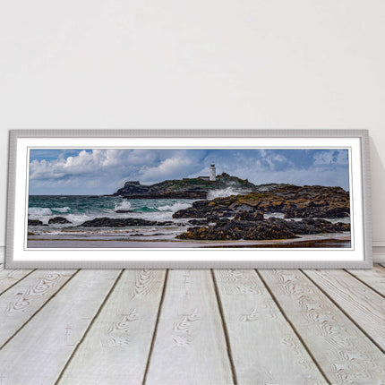 Godrevy Lighthouse with breaking waves at the shore. Cornwall. Framed picture