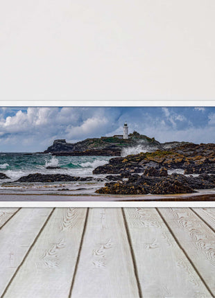 Godrevy Lighthouse with breaking waves at the shore. Cornwall. Framed picture