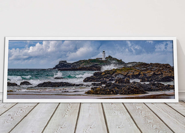 Godrevy Lighthouse with breaking waves at the shore. Cornwall. Framed picture