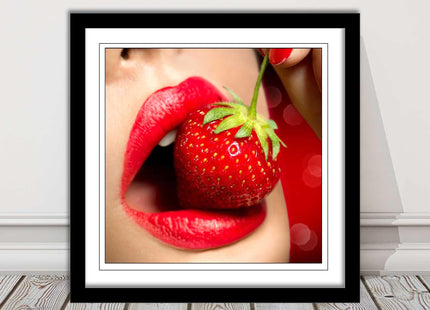Strawberry red lips eating framed picture print with choice frame colours