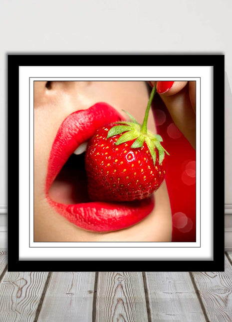 Strawberry red lips eating framed picture print with choice frame colours