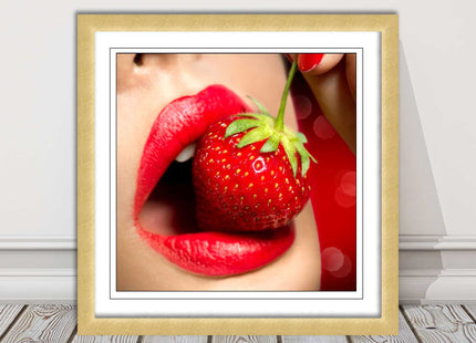 Strawberry red lips eating framed picture print with choice frame colours