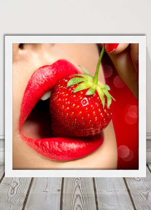 Strawberry red lips eating framed picture print with choice frame colours