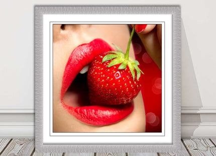 Strawberry red lips eating framed picture print with choice frame colours