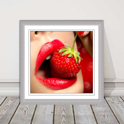 Strawberry red lips eating framed picture print with choice frame colours
