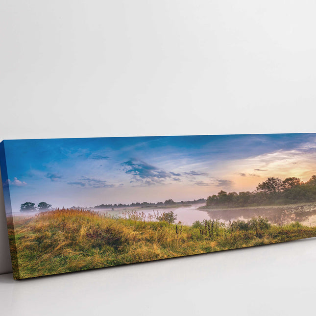 River in the countryside. Sunrise and morning mist. Panoramic canvas picture.