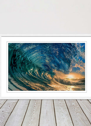Sunset in the surf. Framed picture print with a choice of frame colours.