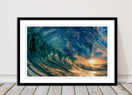 Sunset in the surf. Framed picture print with a choice of frame colours.