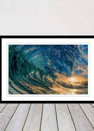 Sunset in the surf. Framed picture print with a choice of frame colours.