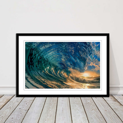 Sunset in the surf. Framed picture print with a choice of frame colours.