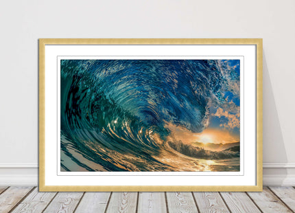 Sunset in the surf. Framed picture print with a choice of frame colours.