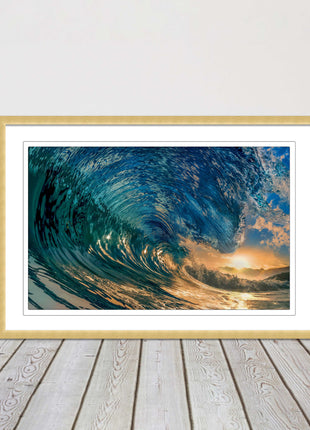 Sunset in the surf. Framed picture print with a choice of frame colours.