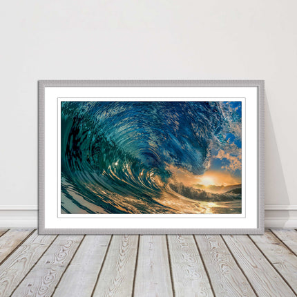 Sunset in the surf. Framed picture print with a choice of frame colours.
