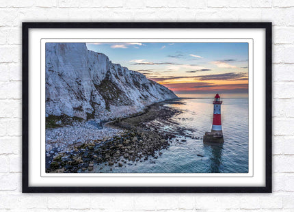 Sunrise at Beachy Head Lighthouse. Framed picture in a choice of styles.
