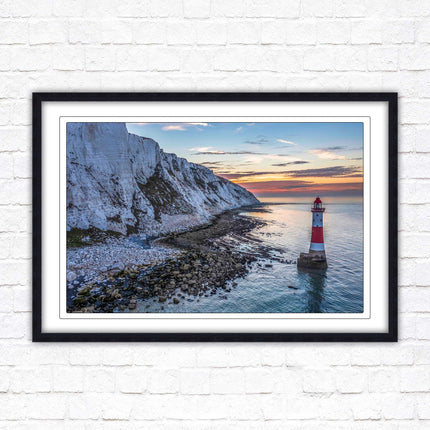 Sunrise at Beachy Head Lighthouse. Framed picture in a choice of styles.