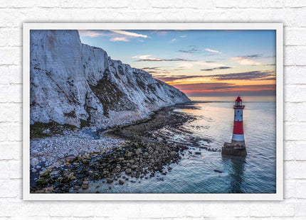 Sunrise at Beachy Head Lighthouse. Framed picture in a choice of styles.