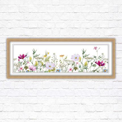 Wild flowers pastel colours on a white background Panoramic framed picture print