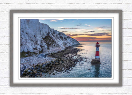 Sunrise at Beachy Head Lighthouse. Framed picture in a choice of styles.