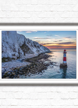 Sunrise at Beachy Head Lighthouse. Framed picture in a choice of styles.