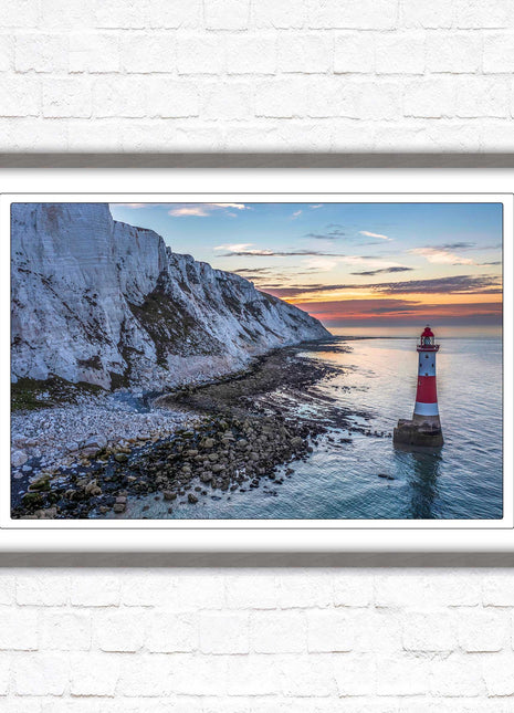 Sunrise at Beachy Head Lighthouse. Framed picture in a choice of styles.