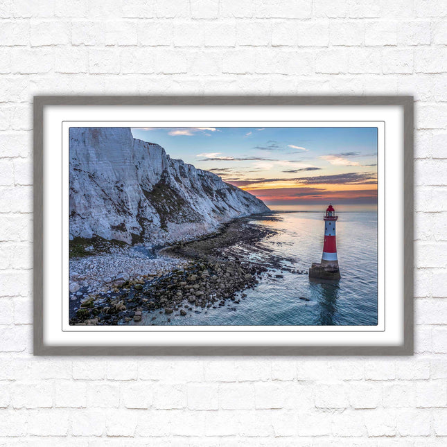 Sunrise at Beachy Head Lighthouse. Framed picture in a choice of styles.