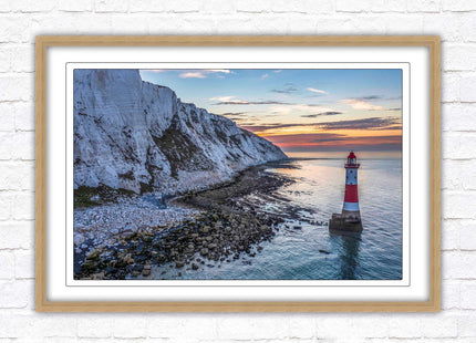 Sunrise at Beachy Head Lighthouse. Framed picture in a choice of styles.