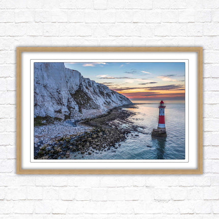 Sunrise at Beachy Head Lighthouse. Framed picture in a choice of styles.