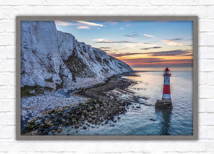 Sunrise at Beachy Head Lighthouse. Framed picture in a choice of styles.