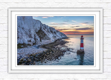 Sunrise at Beachy Head Lighthouse. Framed picture in a choice of styles.